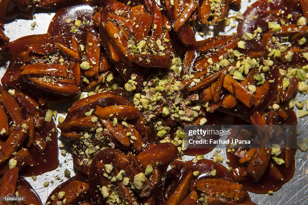 Saffron honey almond brittle candy with pistachios