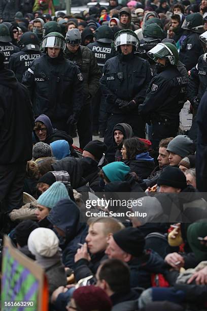 Riot police watch over protesters blockading the entrance to Lausitzer Strasse 8 to prevent the eviction of the German-Turkish Gulbol family on...