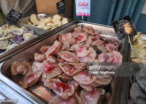 Stand with pink 'Barbie' pierogi is seen during the 21st edition of the annual 'Pierogi' festival held in Maly Rynek, Krakow.