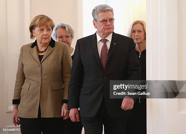 German President Joachim Gauck, incoming German Education Minister Johanna Wanka , outgoing Education Minister Annette Schavan and Chancellor Angela...