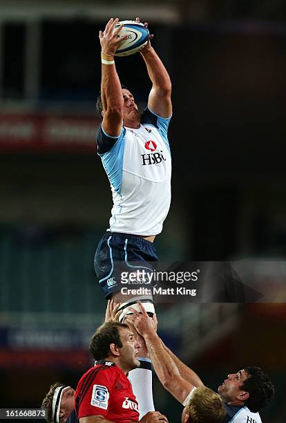 Kane Douglas of the Waratahs jumps at the lineout during the Super Rugby trial match between the Waratahs and the Crusaders at Allianz Stadium on...