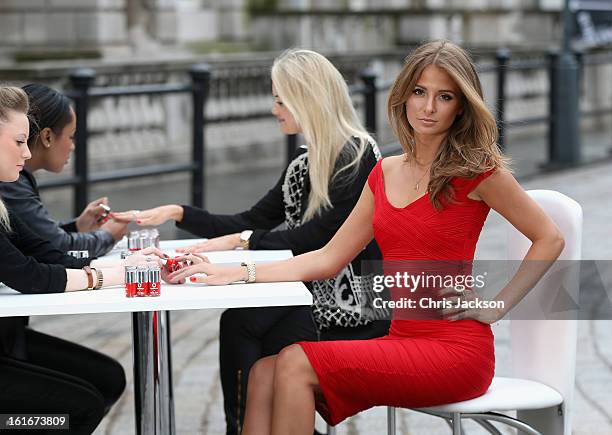 To celebrate Vodafone's sponsorship of London Fashion Week and London Fashion Weekend, Millie Mackintosh samples the new Vodafone Red nail polish,...