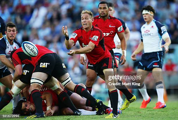 Andy Ellis of the Crusaders passes during the Super Rugby trial match between the Waratahs and the Crusaders at Allianz Stadium on February 14, 2013...