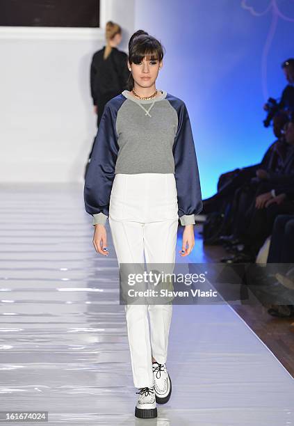 Model walks the runway at the Le Smurfette fall 2013 fashion show during Conair Style360 at Metropolitan Pavilion on February 13, 2013 in New York...