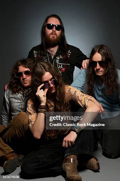 Jonny Williams, Andrew Hunt, Darren King and Gareth Hunt of Welsh rock band Buffalo Summer. Photographed during a portrait shoot for Classic Rock...