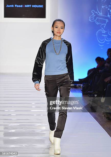 Model walks the runway at the Le Smurfette fall 2013 fashion show during Conair Style360 at Metropolitan Pavilion on February 13, 2013 in New York...