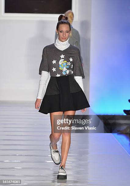 Model walks the runway at the Le Smurfette fall 2013 fashion show during Conair Style360 at Metropolitan Pavilion on February 13, 2013 in New York...