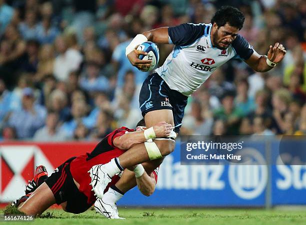 Sitaleki Timani of the Waratahs charges forward during the Super Rugby trial match between the Waratahs and the Crusaders at Allianz Stadium on...