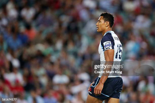 Israel Folau of the Waratahs looks on during the Super Rugby trial match between the Waratahs and the Crusaders at Allianz Stadium on February 14,...