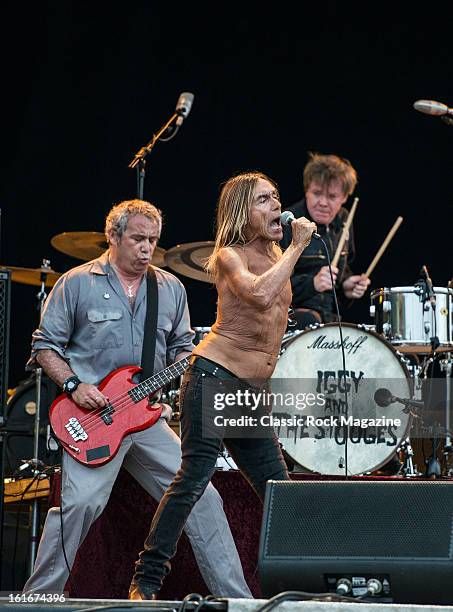 Mike Watt, Iggy Pop and Toby Dammit of American rock band Iggy and The Stooges performing live onstage at Hard Rock Calling Festival, July 13, 2012.