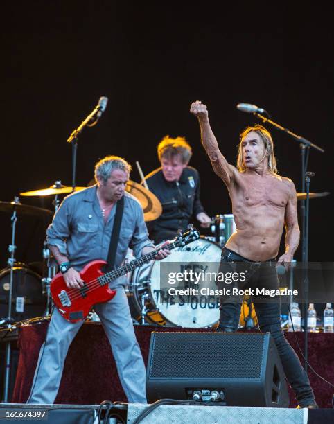 Mike Watt, Toby Dammit and Iggy Pop of American rock band Iggy and The Stooges performing live onstage at Hard Rock Calling Festival, July 13, 2012.