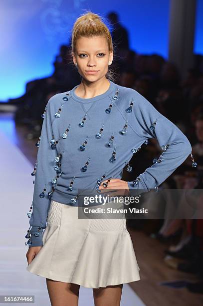 Model walks the runway at the Le Smurfette fall 2013 fashion show during Conair Style360 at Metropolitan Pavilion on February 13, 2013 in New York...