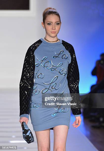 Model walks the runway at the Le Smurfette fall 2013 fashion show during Conair Style360 at Metropolitan Pavilion on February 13, 2013 in New York...