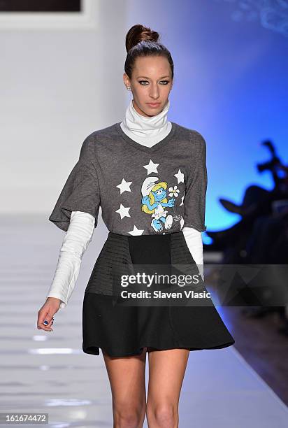 Model walks the runway at the Le Smurfette fall 2013 fashion show during Conair Style360 at Metropolitan Pavilion on February 13, 2013 in New York...