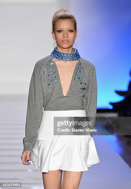 Model walks the runway at the Le Smurfette fall 2013 fashion show during Conair Style360 at Metropolitan Pavilion on February 13, 2013 in New York...