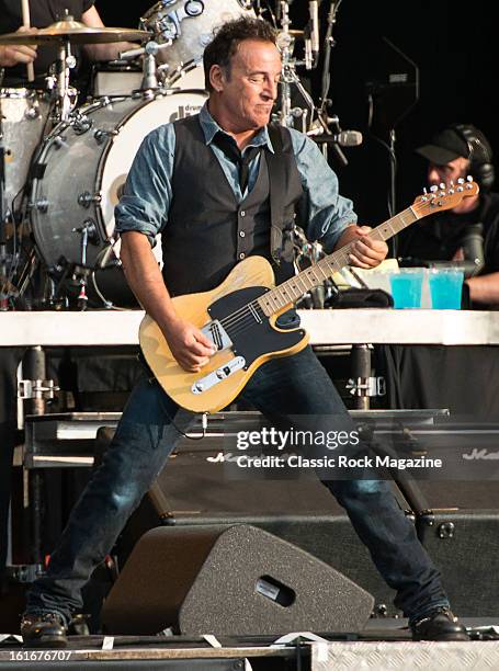 American singer-songwriter Bruce Springsteen performing with the E Street Band live onstage at Hard Rock Calling Festival, July 14, 2012.