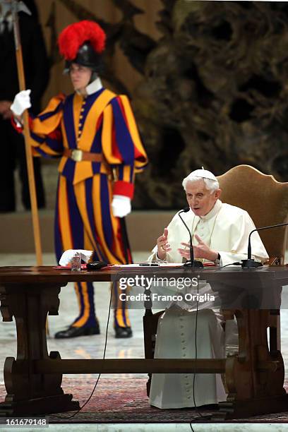 Pope Benedict XVI attends a meeting with parish priests of Rome's diocese at the Paul VI Hall on February 14, 2013 in Vatican City, Vatican. The...