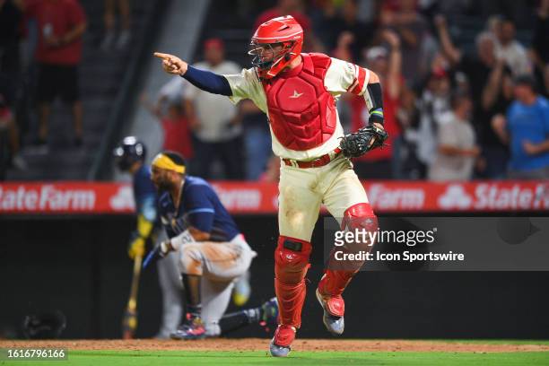 Los Angeles Angels catcher Logan O'Hoppe celebrates after tagging out Tampa Bay Rays first baseman Yandy Diaz to complete a triple play in the 8th...