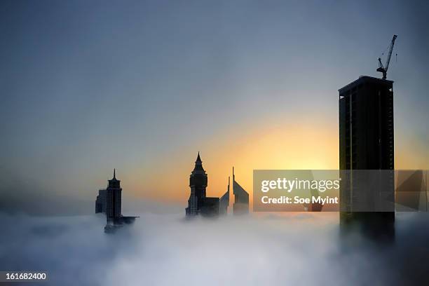 sunrise on fogs - soe myint stock-fotos und bilder