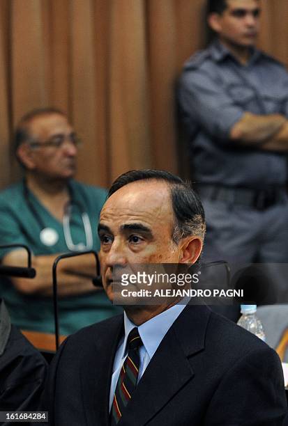 Julio Poch, a Dutch national and a former Argentine naval aviator extradited from Spain in May 2010, attends a trial as defendant, in Buenos Aires,...