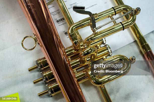 Mellophone sits before it is finished being assembly at a work station in the manufacturing department of the E.K Blessing Co. In Elkhart, Indiana,...