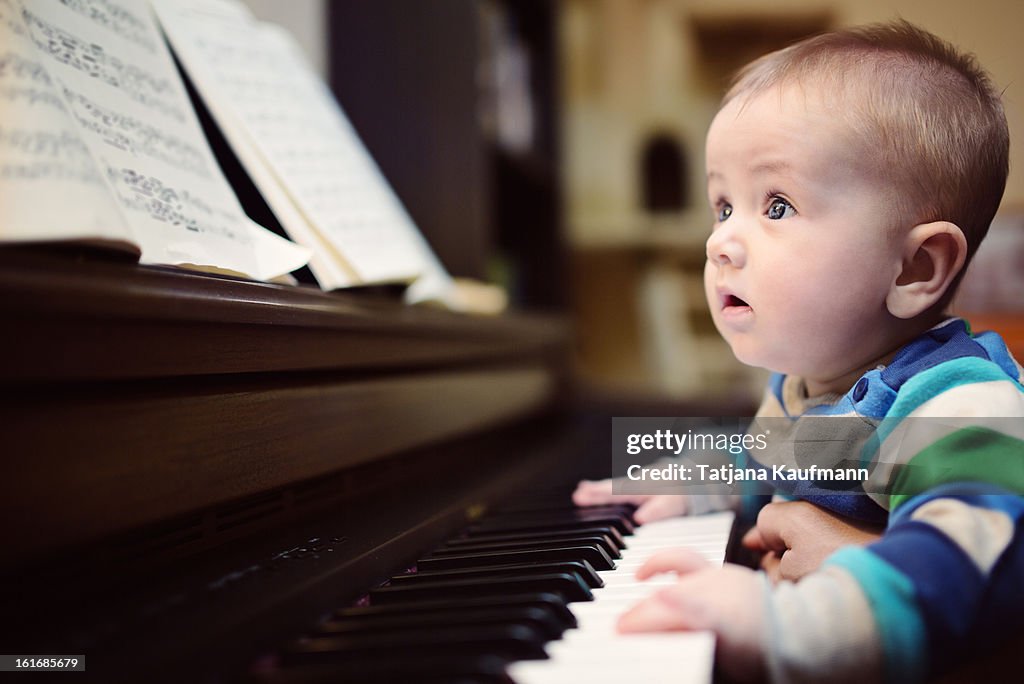 Baby "playing" piano