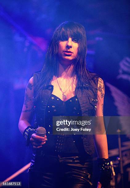 Vocalist Liv Jagrell of Sister Sin performs in concert at Mojoes on February 13, 2013 in Joliet, Illinois.