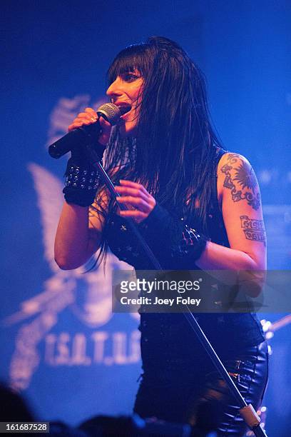Vocalist Liv Jagrell of Sister Sin performs in concert at Mojoes on February 13, 2013 in Joliet, Illinois.