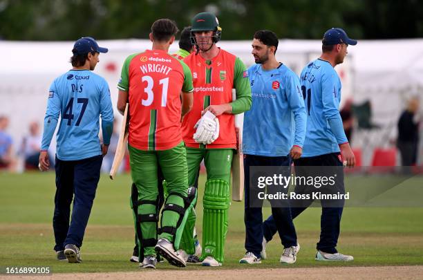 Chris Wright and Louis Kimber of Leicestershire celebrate after the Leicestershire Foxes v Essex - Metro Bank One Day Cup at Kibworth CC on August...