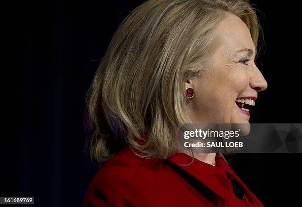 Former Secretary of State Hillary Clinton speaks after receiving awards from Secretary of Defense Leon Panetta and Chairman of the Joint Chiefs...