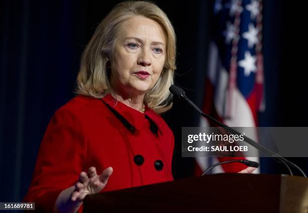 Former Secretary of State Hillary Clinton speaks after receiving awards from Secretary of Defense Leon Panetta and Chairman of the Joint Chiefs...