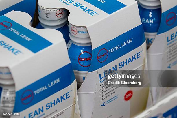 Holdings Inc. Dietary shakes are displayed for sale at a store in New York, U.S., on Thursday, Feb. 14, 2013. GNC Holdings Inc., a retailer of health...