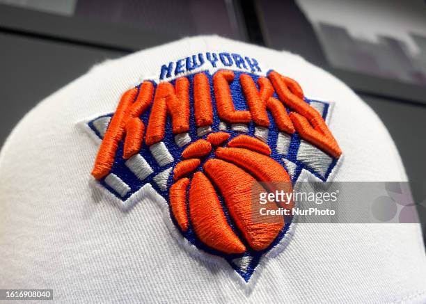 New York Knicks emblem on New Era cap is seen in a store in Krakow, Poland on August 22, 2023.