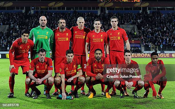 Liverpool FC line up for a group photograph before the UEFA Europa League round of 32 first leg match between FC Zenit St Petersburg and Liverpool on...