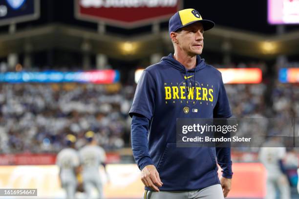 Manager Craig Counsell of the Milwaukee Brewers reacts after a pitching change during the sixth inning against the Los Angeles Dodgers at Dodger...