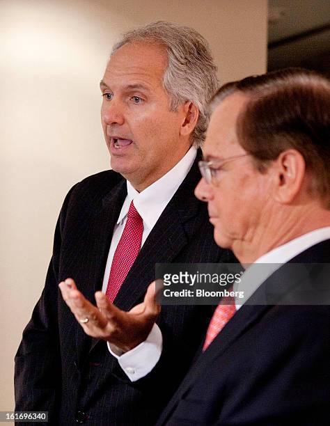 Alex Behring, managing partner at 3G Capital, left, speaks alongside Bill Johnson, chief executive officer of H.J. Heinz Co., during a press...