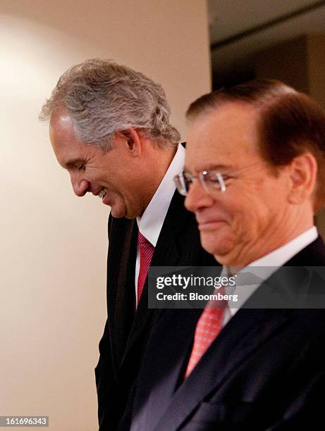 Alex Behring, managing partner at 3G Capital, left, and Bill Johnson, chief executive officer of H.J. Heinz Co., share a laugh during a press...