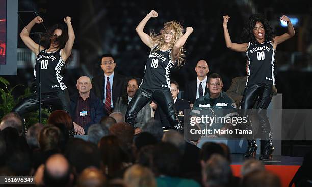 Brooklyn Nets cheerleaders perform before New York Mayor Michael Bloomberg delivered the annual State of the City address at the Barclays Center on...