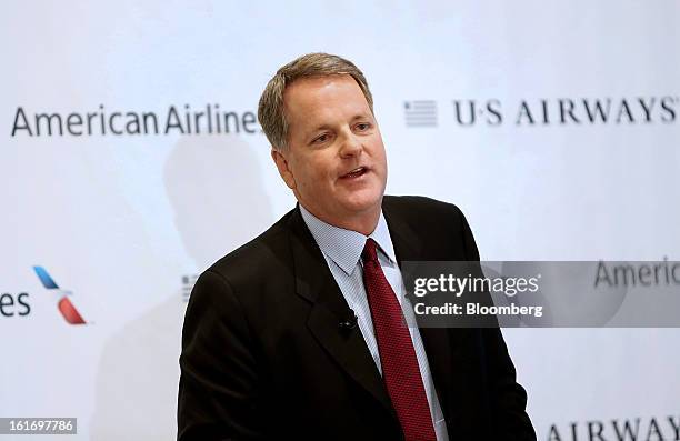 Doug Parker, chief executive officer of US Airways Group Inc., speaks during a press conference at Dallas Fort Worth Airport in Fort Worth, Texas,...