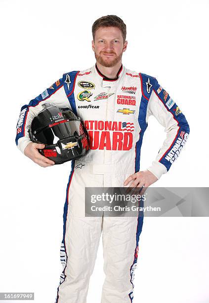 Driver Dale Earnhardt Jr. Poses during portraits for the 2013 NASCAR Sprint Cup Series at Daytona International Speedway on February 14, 2013 in...
