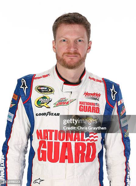 Driver Dale Earnhardt Jr. Poses during portraits for the 2013 NASCAR Sprint Cup Series at Daytona International Speedway on February 14, 2013 in...