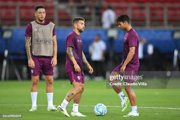 Alejandro Gomez and Oliver Torres of Sevilla look on during a Sevilla FC Training Session ahead of the UEFA Super Cup 2023 match between Manchester...