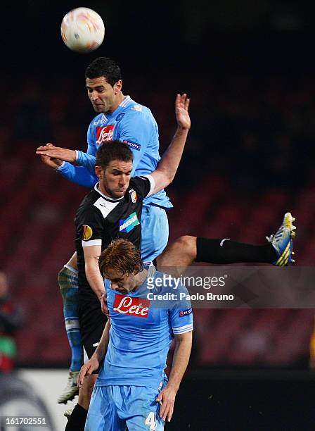 Marco Donadel and Miguel Britos of SSC Napoli compete for the ball with Marek Bakos of FC Viktoria Plzen during the UEFA Europa League Round of 32...