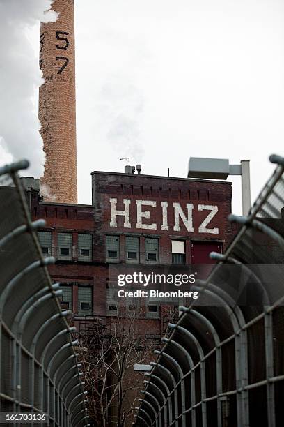 Smoke pours out of a stack at a H.J. Heinz Co. Production facility in Pittsburgh, Pennsylvania, U.S., on Thursday, Feb. 14, 2013. Warren Buffett’s...