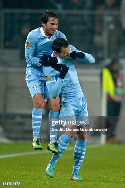 Libor Kozak of Lazio celebrates with teammate Alvaro Gonzalez after scoring his team's second goal during the UEFA Europa League round of 32 first...