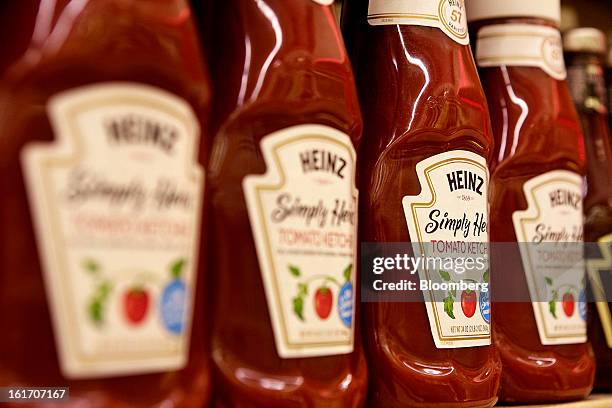 Bottles of H.J. Heinz Co. Ketchup products are displayed on a shelf for sale at grocery store in Pittsburgh, Pennsylvania, U.S., on Thursday, Feb....