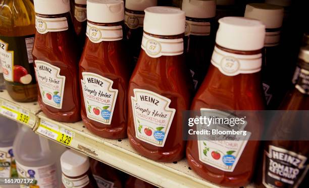 Bottles of H.J. Heinz Co. Ketchup products are displayed on a shelf for sale at grocery store in Pittsburgh, Pennsylvania, U.S., on Thursday, Feb....