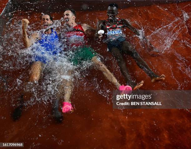 Gold medallist for the men's high jump Italy's Gianmarco Tamberi, gold medallist for the men's 3000m steeplechase Morocco's Soufiane El Bakkali and...