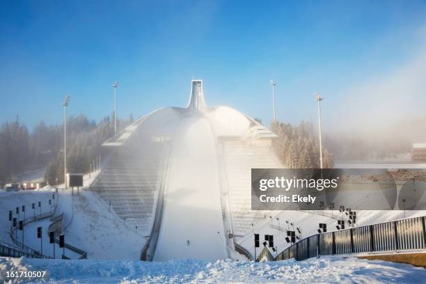 holmenkollen ski arena  in mist. - holmenkollen stock pictures, royalty-free photos & images