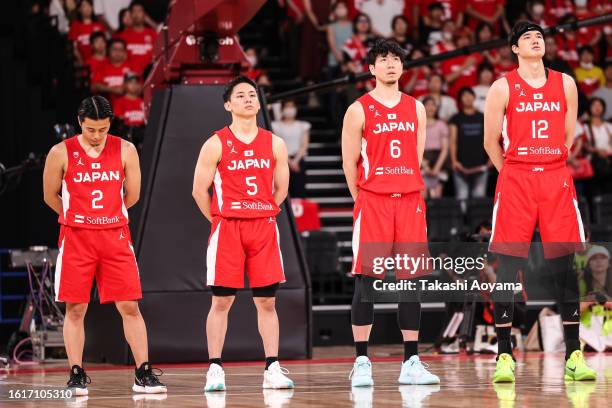 Yuki Togashi, Yuki Kawamura, Makoto Hiejima and Yuta Watanabe of Japan line up for the national anthem prior to the international basketball game...